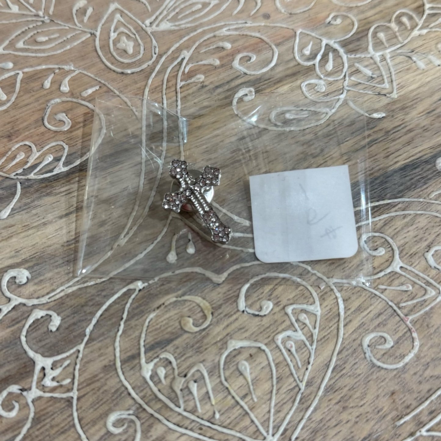 Silver Orthodox cross lapel pin with ornate detailing and secure metal backing, measuring 1 inch tall.