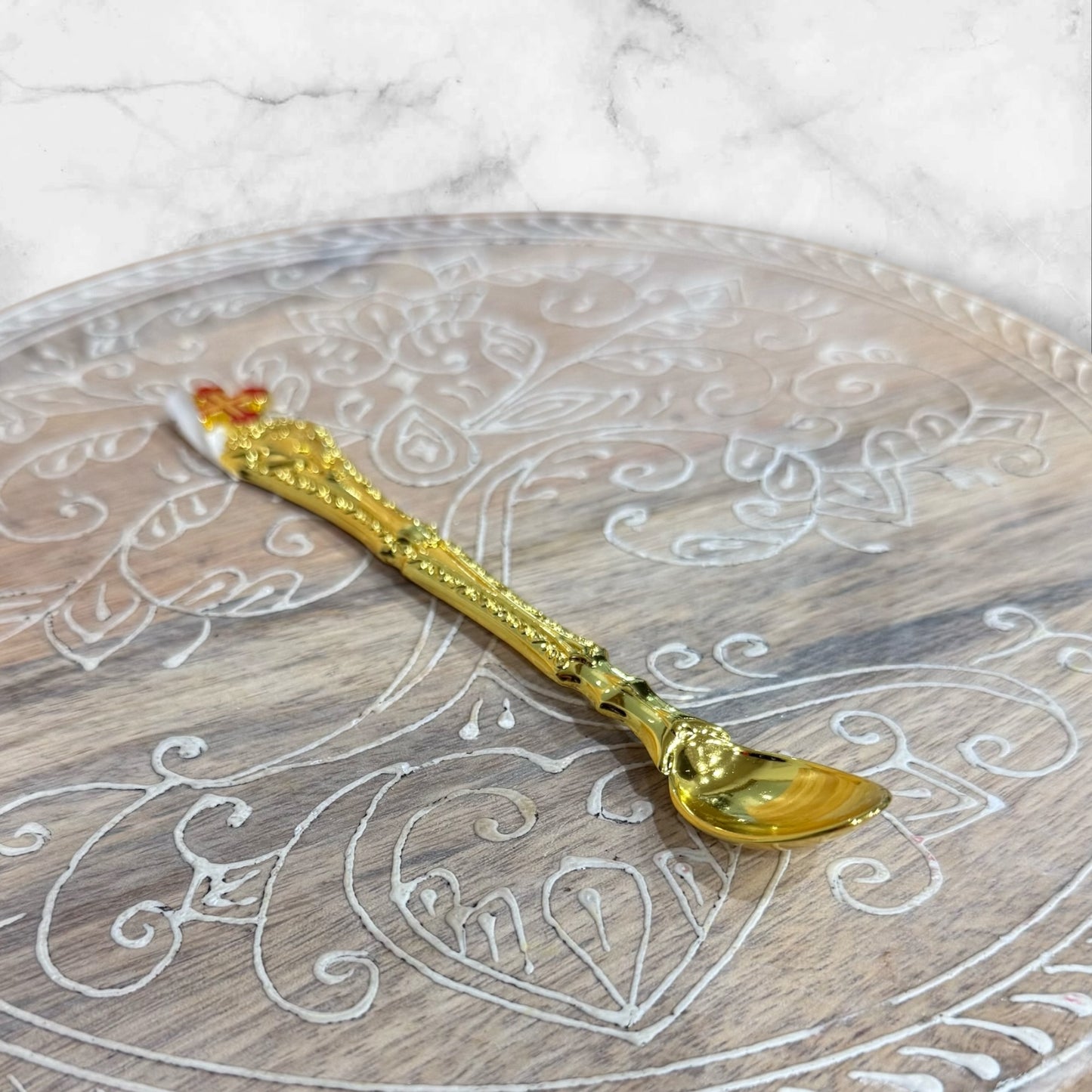Gold Orthodox Baptism and Holy Communion spoon with decorative red enamel Orthodox cross.
