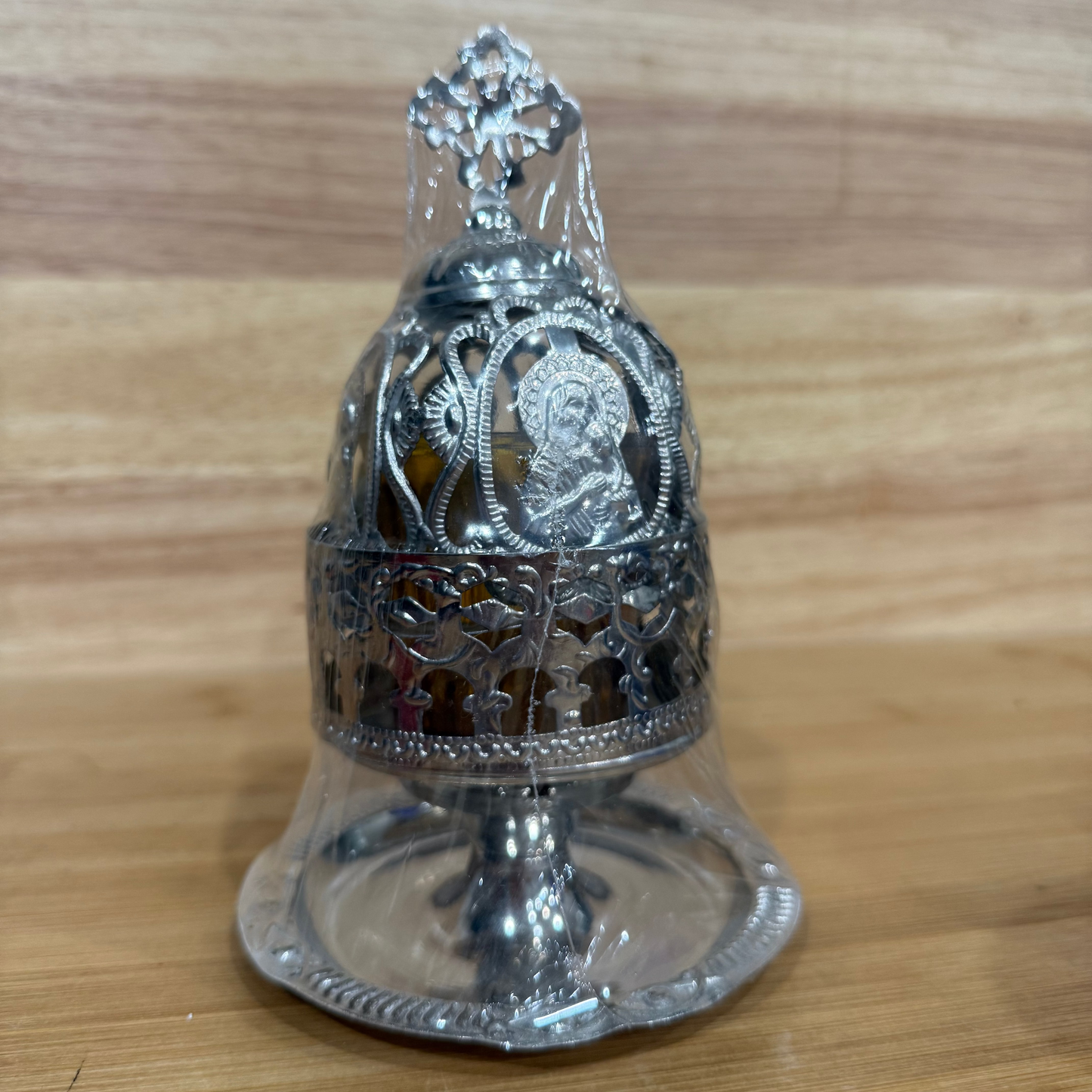 Orthodox tabletop incense burner with decorative saint icon and cross finial for home prayer