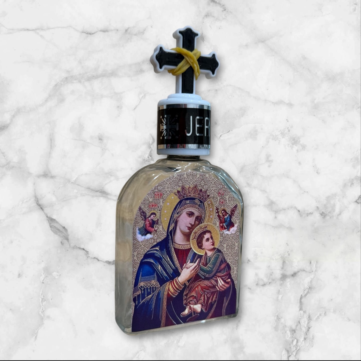 Orthodox holy water bottle featuring the icon of Our Lady of Perpetual Help with decorative cross stopper front image