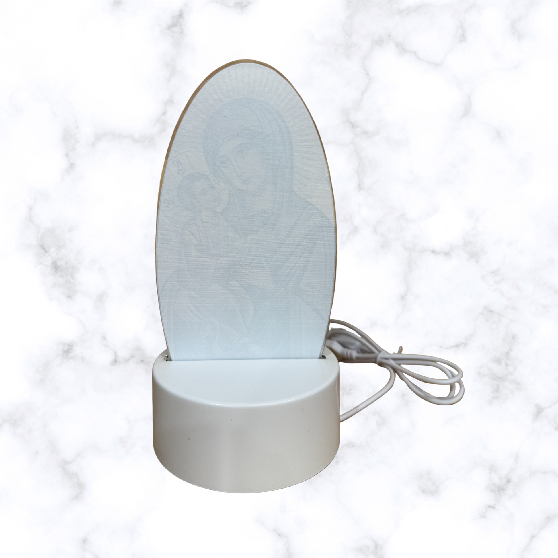 Illuminated acrylic LED night light featuring the Mother of God of Perpetual Help icon on a white USB-powered base. Ideal for an icon corner, bedside table, nursery, or prayer space.