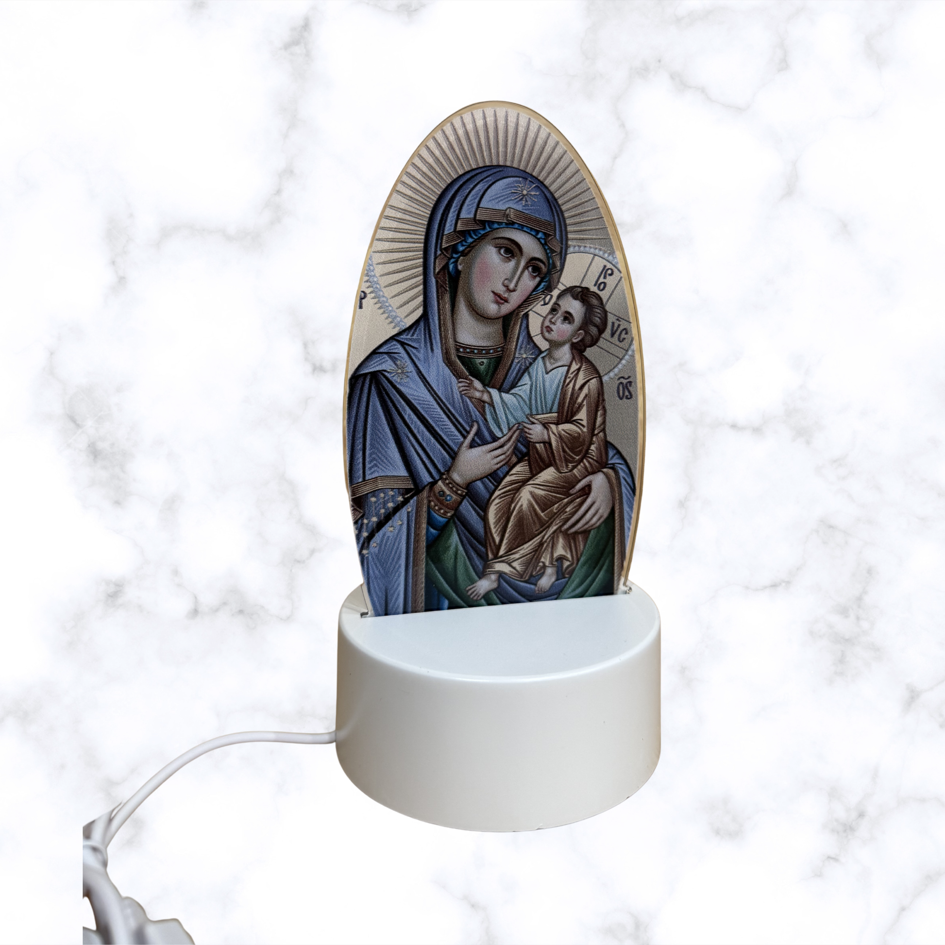 Illuminated acrylic LED night light featuring the Mother of God of Perpetual Help icon on a white USB-powered base. Ideal for an icon corner, bedside table, nursery, or prayer space.