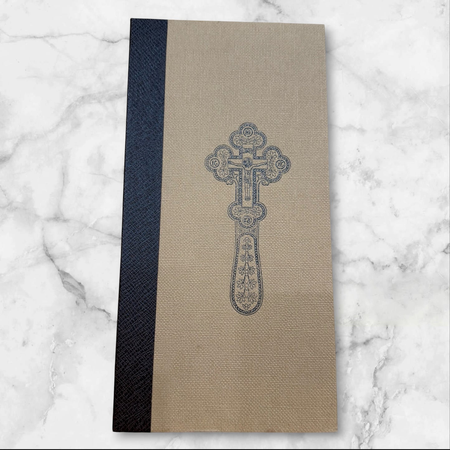 Green enamel blessing cross with decorative metal crucifix in a premium gift box, measuring 7.875 inches tall.