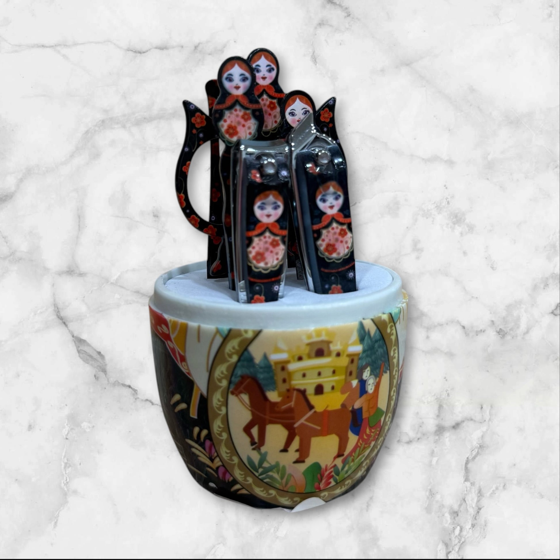 black Russian Matryoshka nesting doll manicure set with a multi piece stainless steel nail care kit inside a decorative travel case.