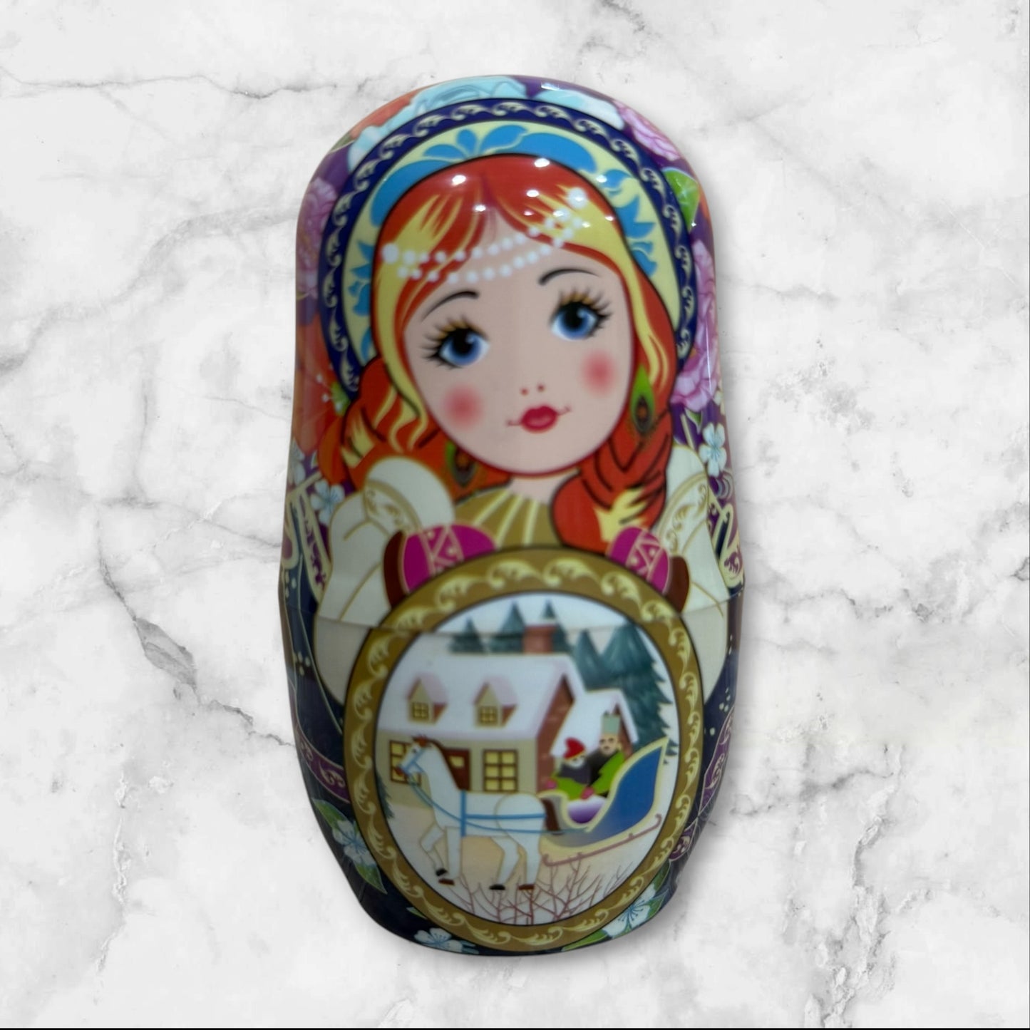 Russian Matryoshka nesting doll manicure set with a -piece stainless steel nail care kit inside a decorative travel case.