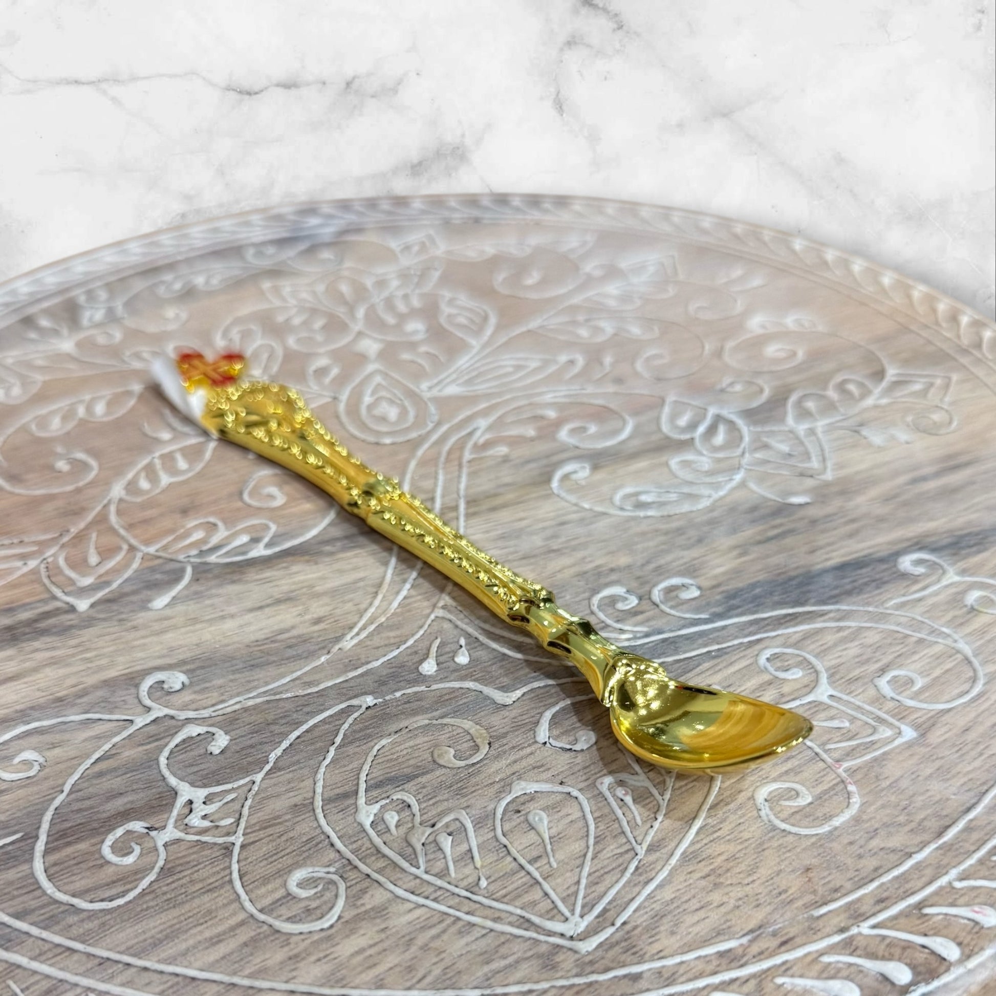 Gold Orthodox Baptism and Holy Communion spoon with decorative red enamel Orthodox cross.
