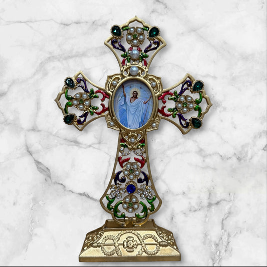 Decorative Orthodox cross-shaped icon stand with colorful enamel accents and a removable oval icon for a home prayer corner