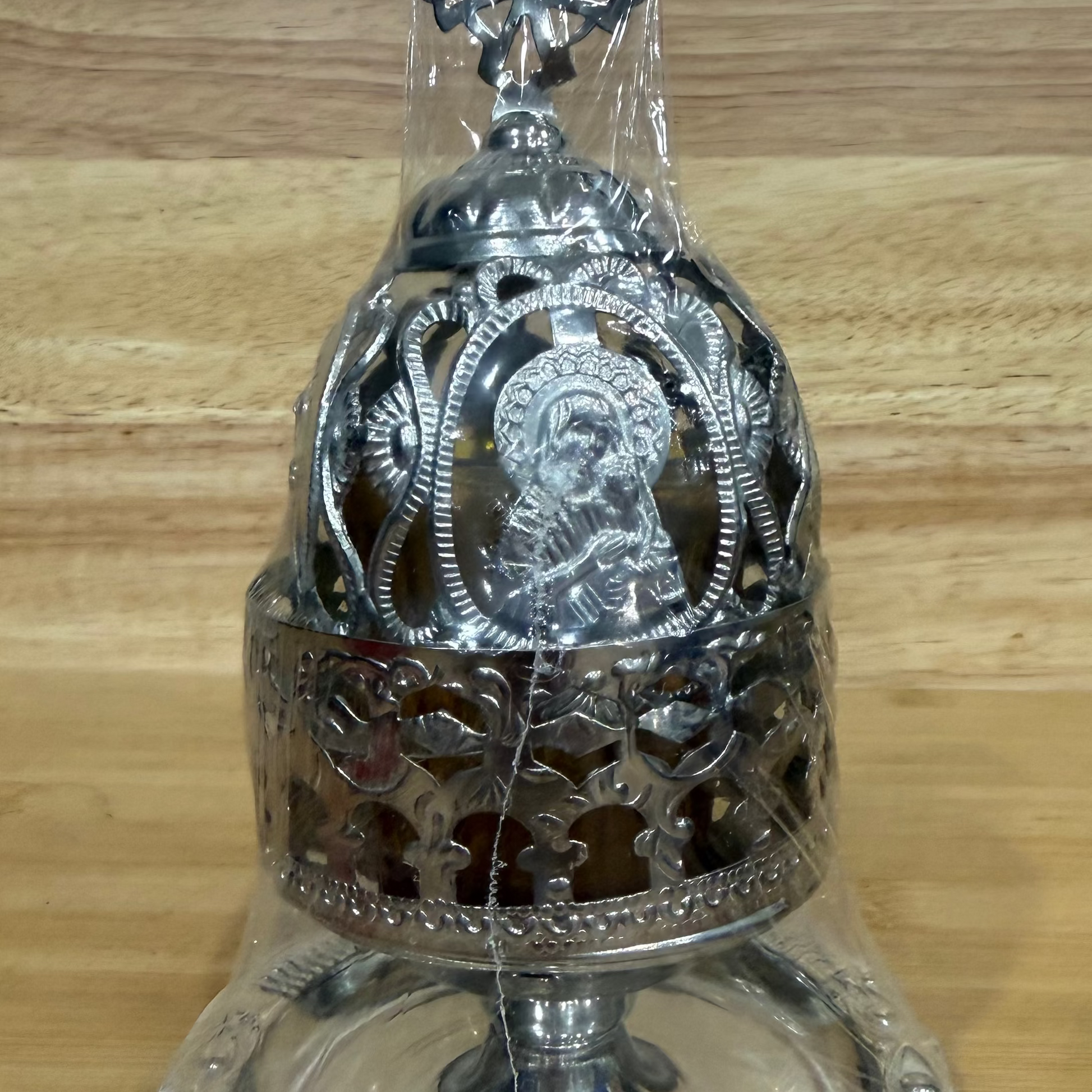 Orthodox tabletop incense burner with decorative saint icon and cross finial for home prayer