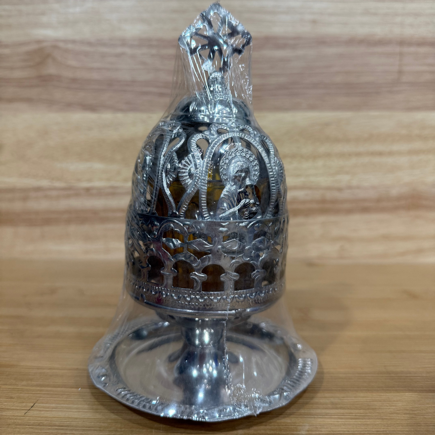 Orthodox tabletop incense burner with decorative saint icon and cross finial for home prayer