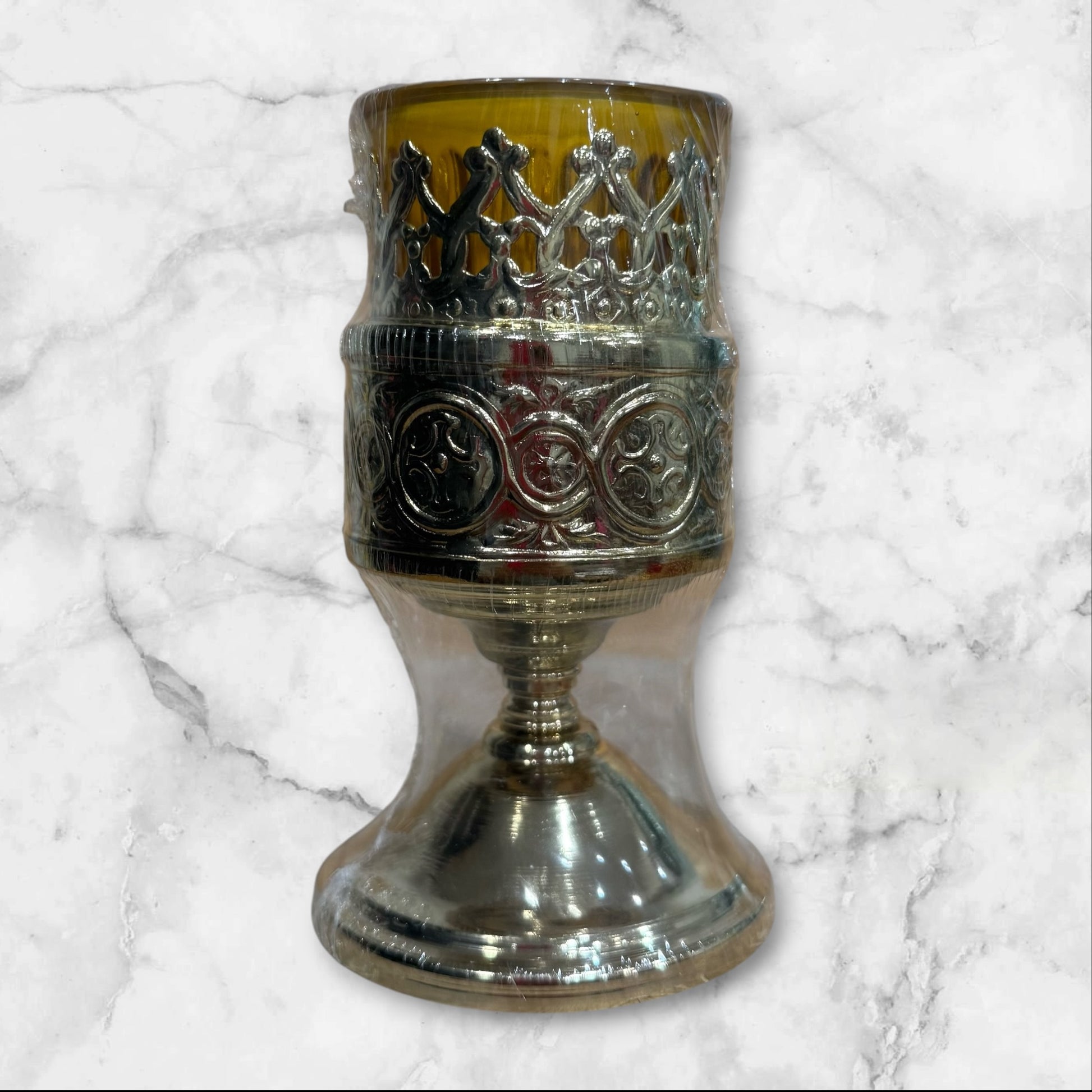 Orthodox silver-tone vigil lamp holder with amber glass cup for a home prayer corner