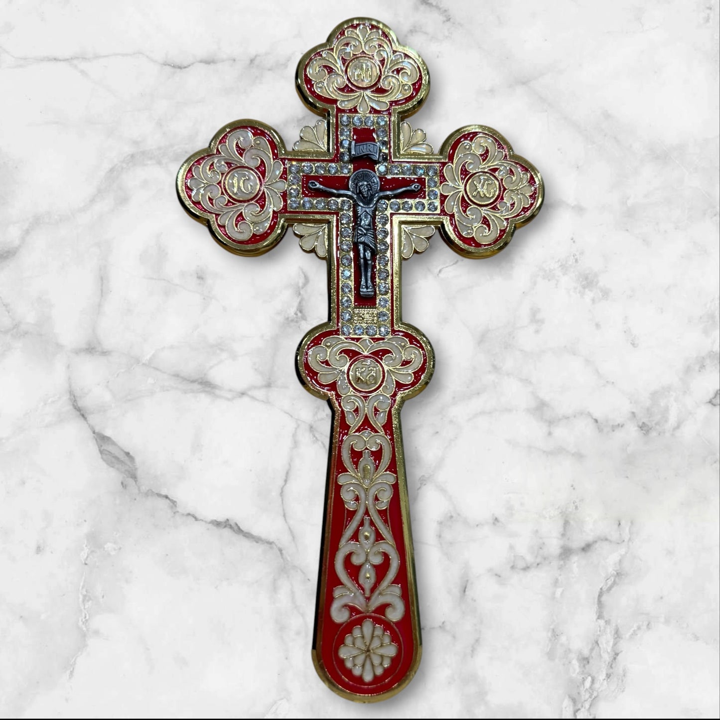 red enamel blessing cross with decorative metal crucifix in a premium gift box, measuring 7.875 inches tall.