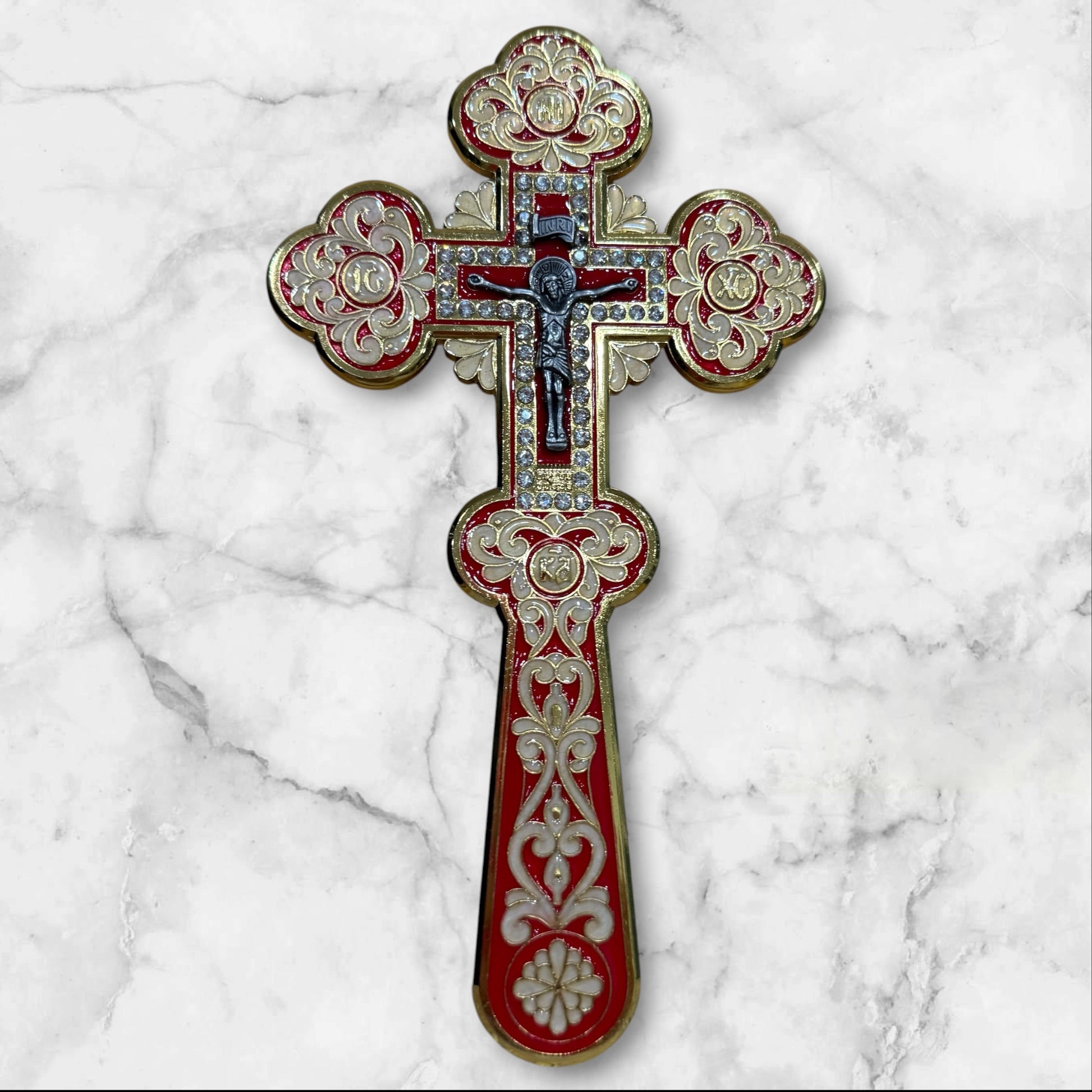 red enamel blessing cross with decorative metal crucifix in a premium gift box, measuring 7.875 inches tall.