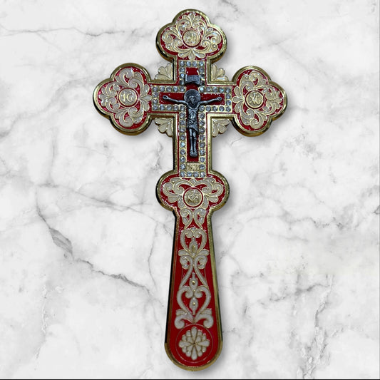 red enamel blessing cross with decorative metal crucifix in a premium gift box, measuring 7.875 inches tall.