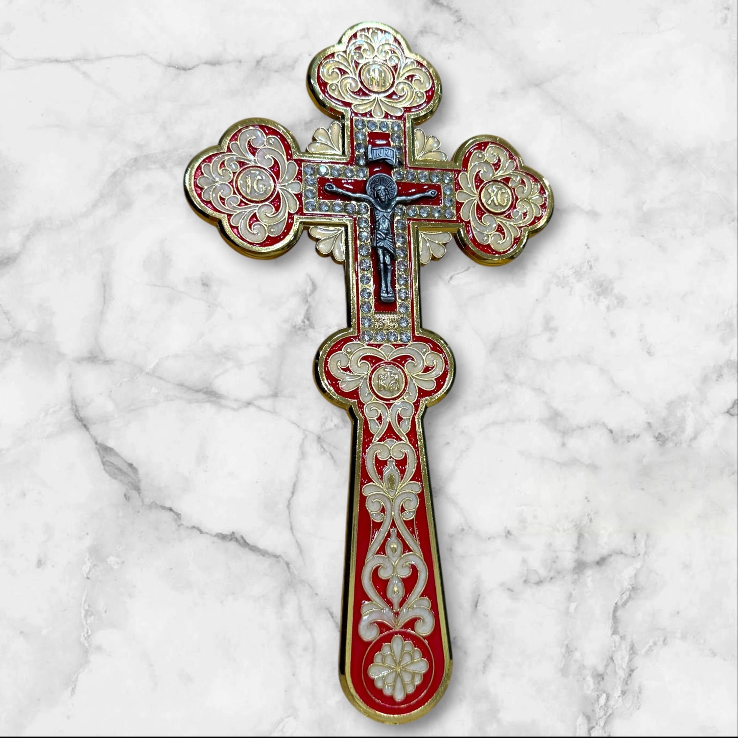 red enamel blessing cross with decorative metal crucifix in a premium gift box, measuring 7.875 inches tall.