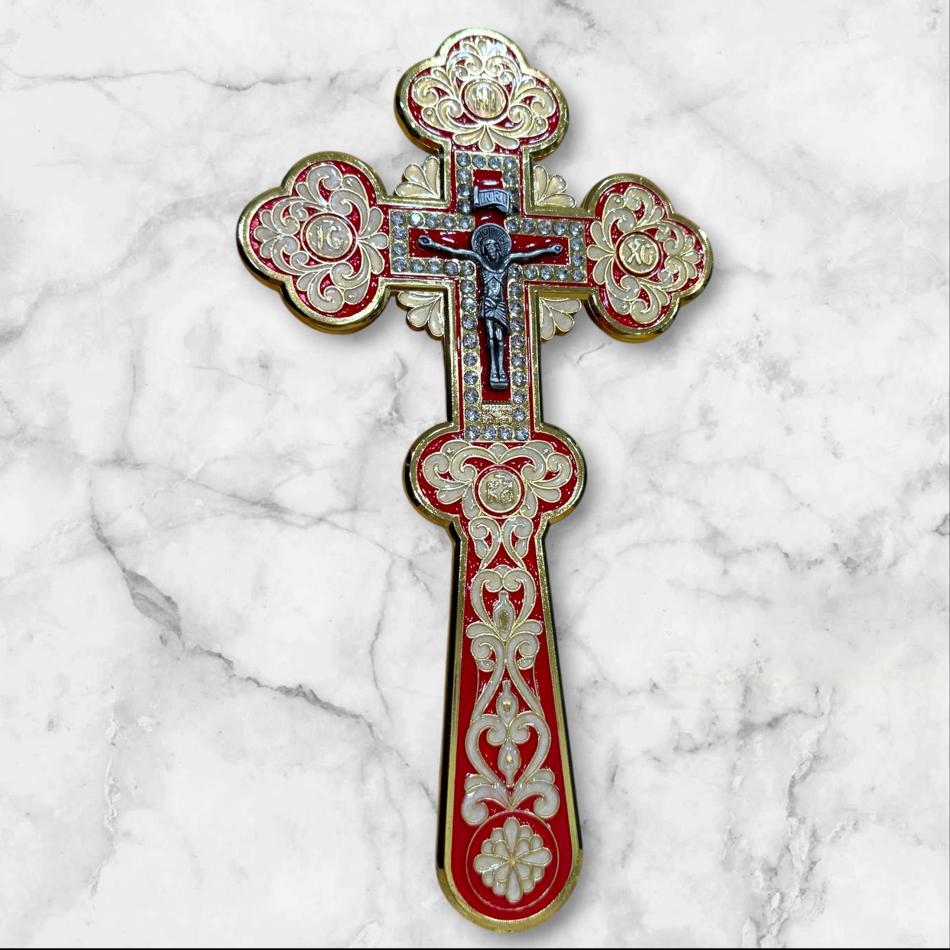 red enamel blessing cross with decorative metal crucifix in a premium gift box, measuring 7.875 inches tall.
