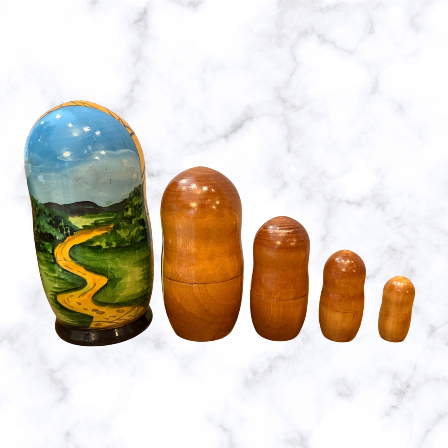 Hand-painted Russian nesting dolls from Sergiev Posad featuring five nesting dolls depicting scenes from the Passion of Christ.