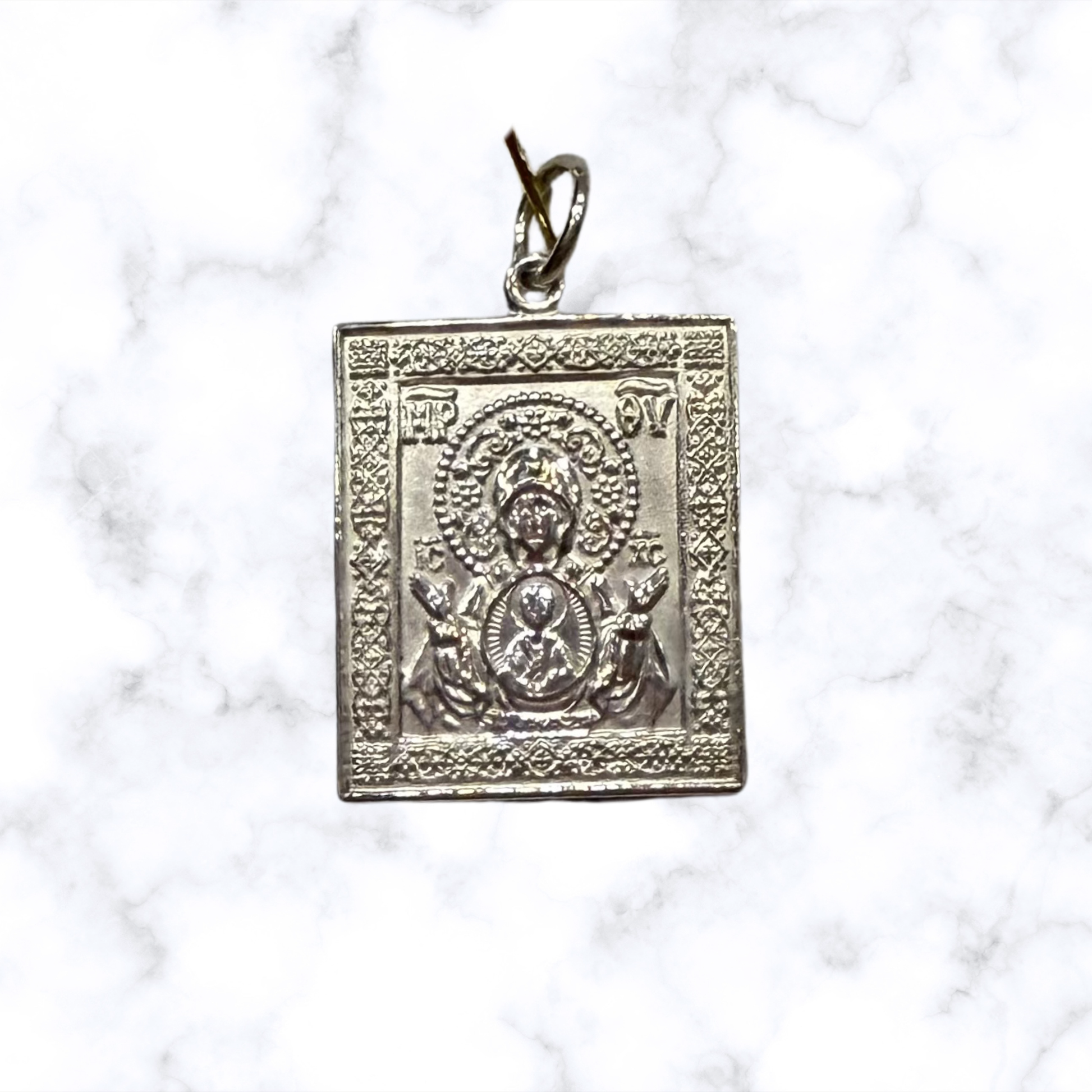 Silver Saint Matrona of Moscow icon pendant with detailed Orthodox icon design.
