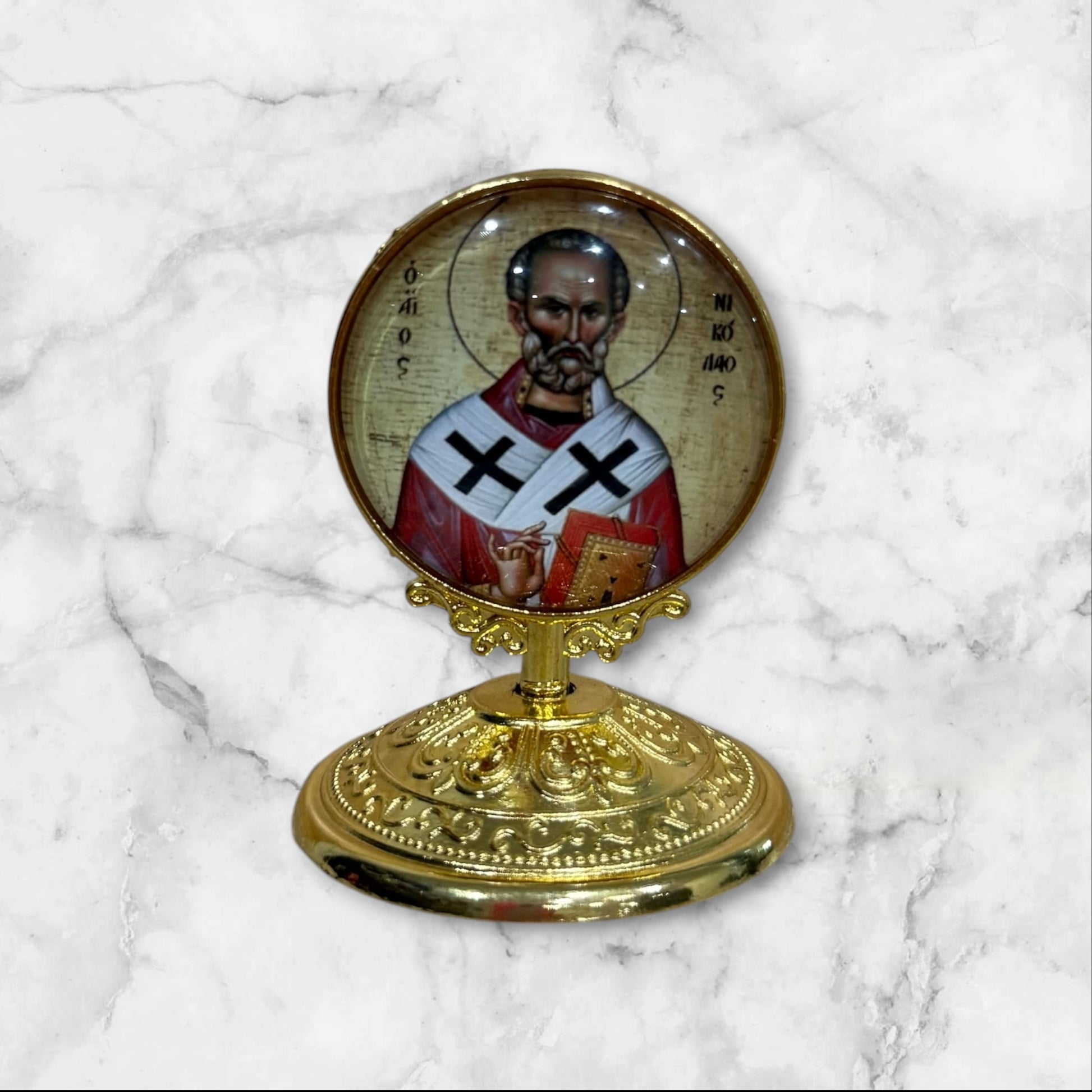 Standing Orthodox icon of Saint Nicholas the Wonderworker with decorative gold base and self-adhesive mounting