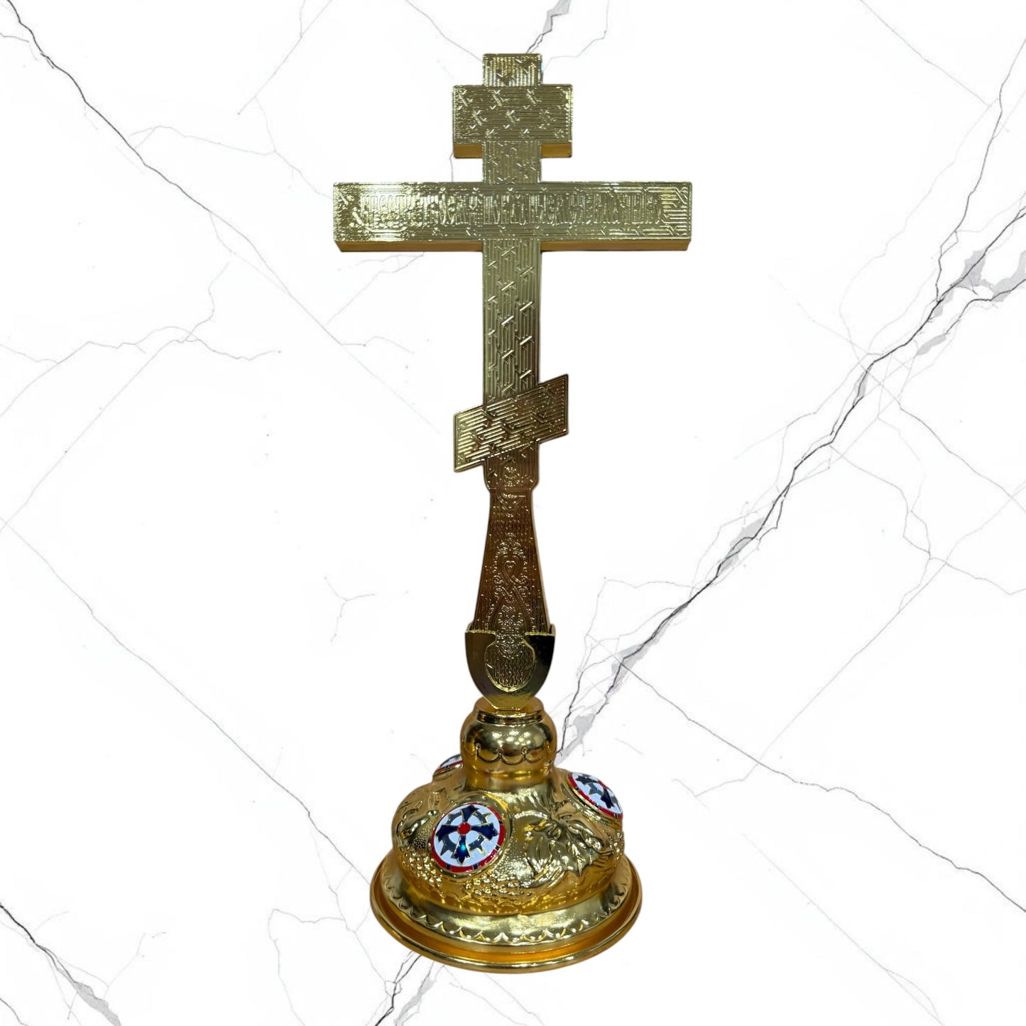 Ornate Orthodox standing blessing cross in blue and gold with sacred icon medallions, jeweled accents, Crucifixion detail, and decorative base.