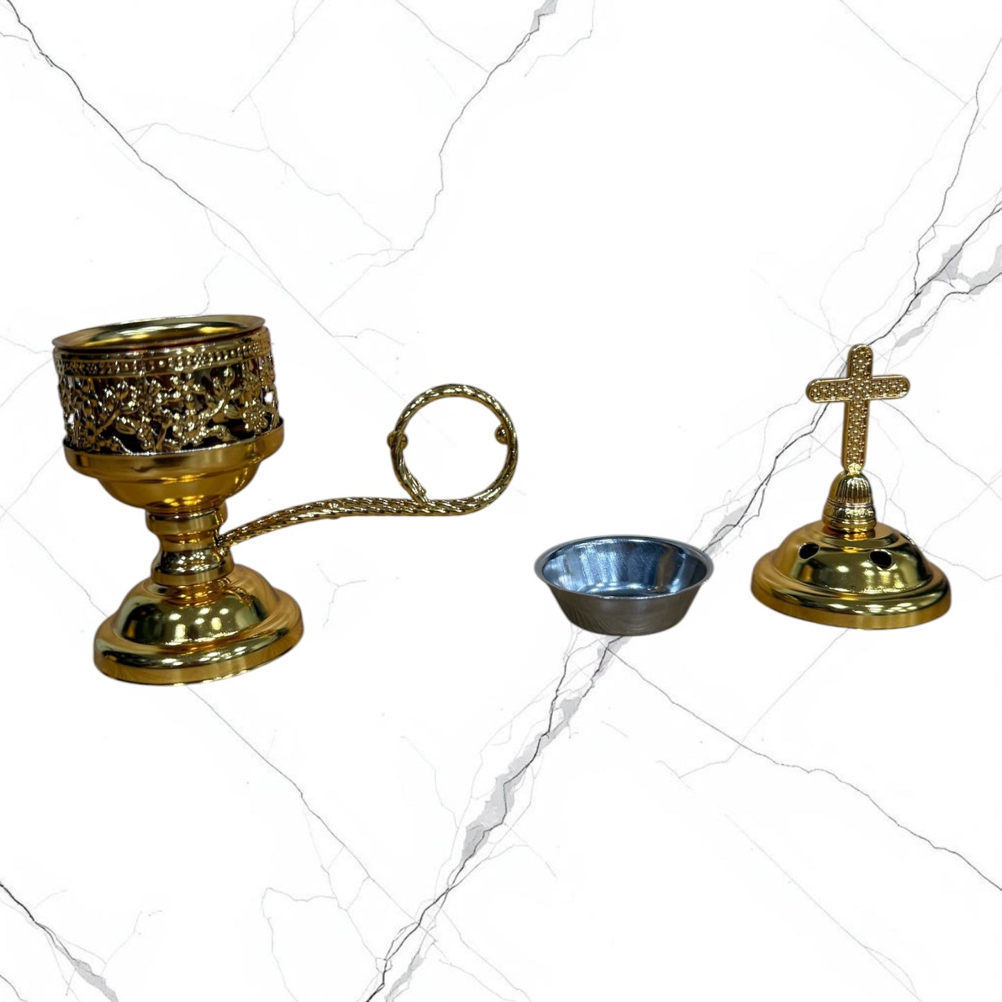gold standing incense burner with carrying handle, removable cross lid, charcoal cup, and pedestal base for burning incense during prayer.