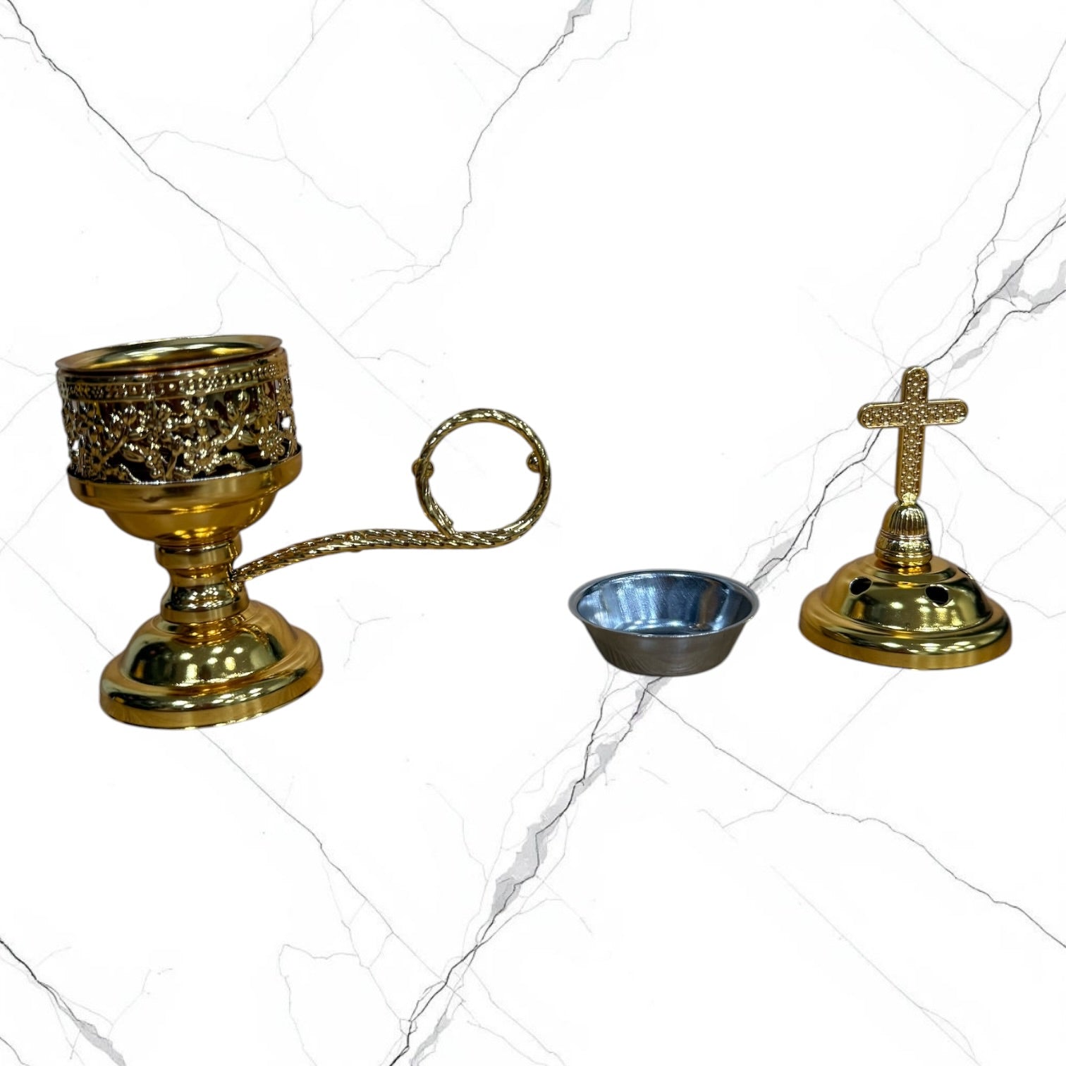 gold standing incense burner with carrying handle, removable cross lid, charcoal cup, and pedestal base for burning incense during prayer.