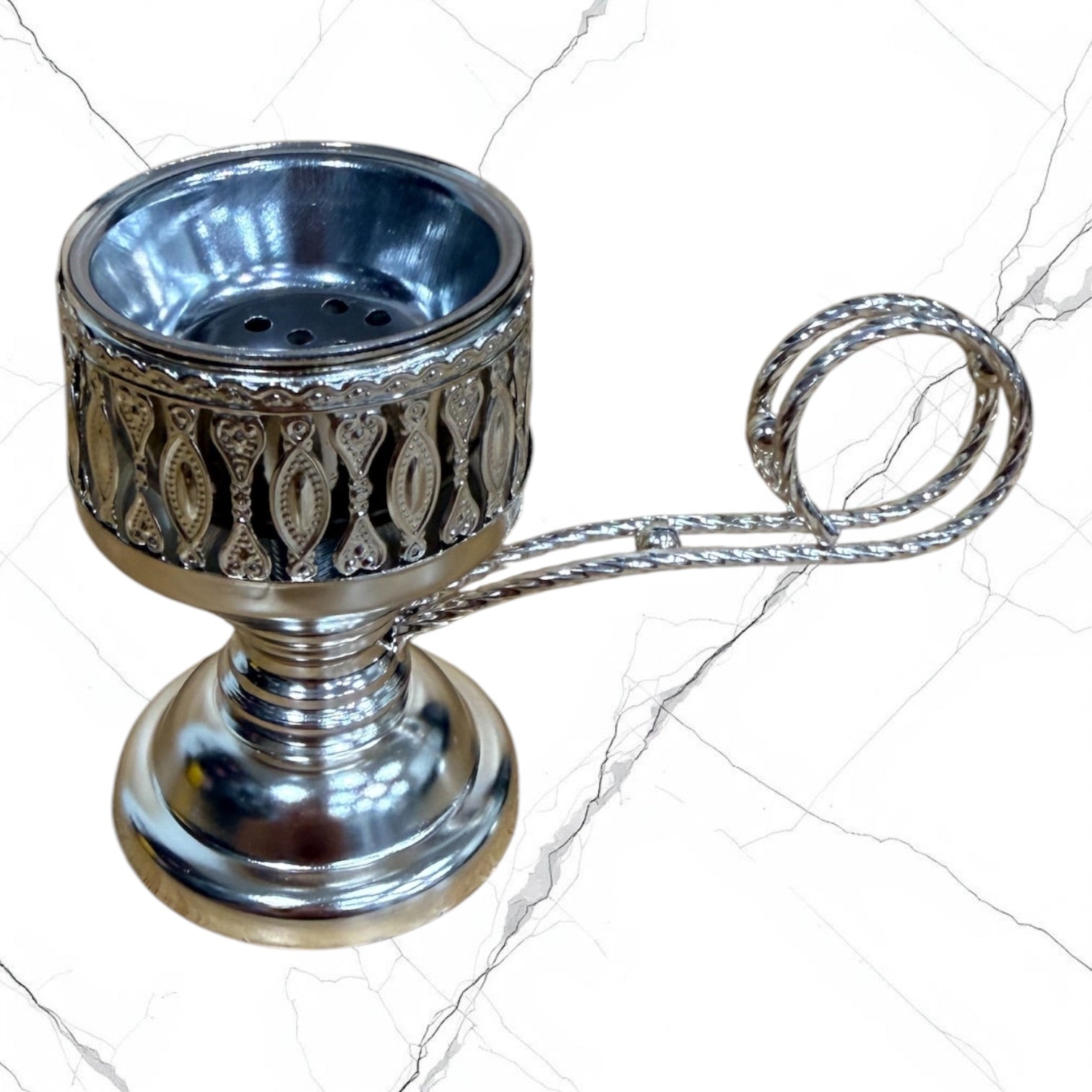 Silver-tone standing incense burner with carrying handle, removable cross lid, charcoal cup, and pedestal base for burning incense during prayer.